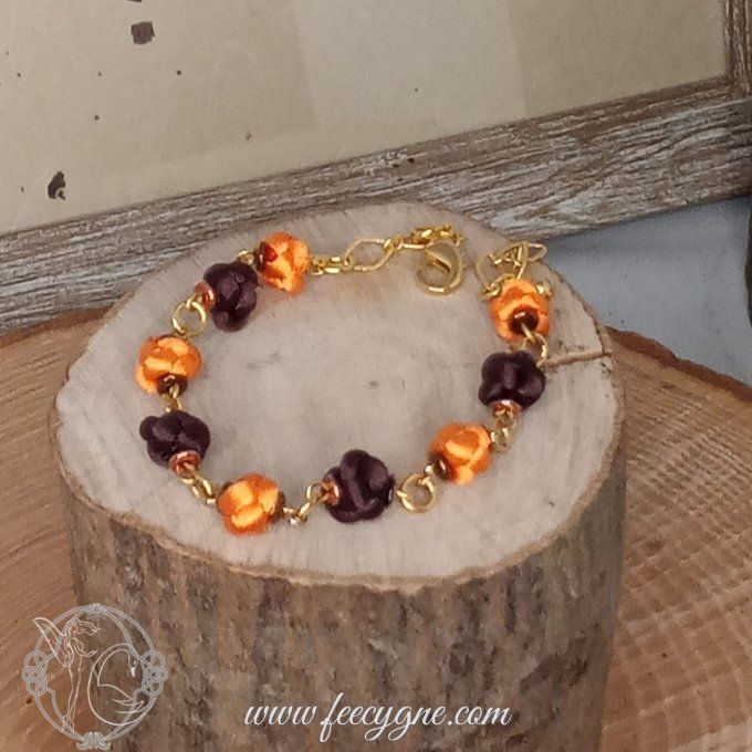 Bracelet noeud boule sur chainette dorée